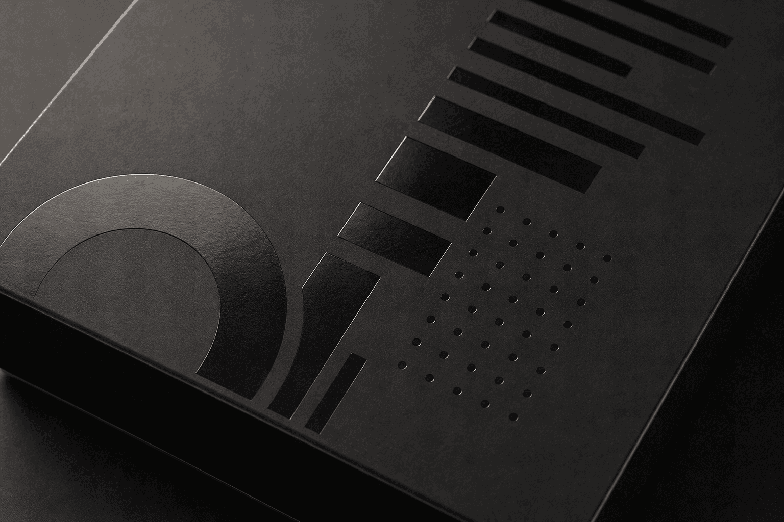 Glossy spot UV pattern on matte black packaging